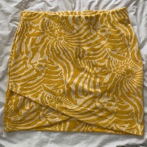 Yellow floral patterned mini skirt